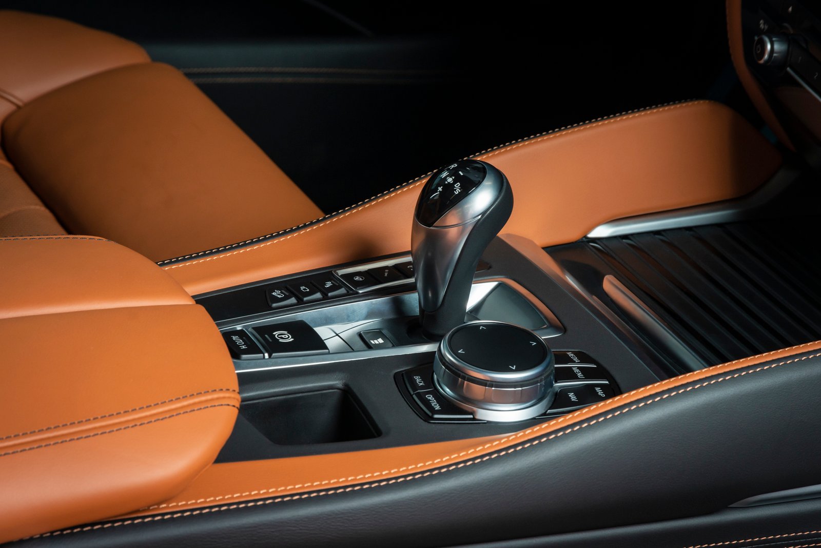 part-of-leather-car-panel-with-at-switch-2025-01-10-22-33-49-utc